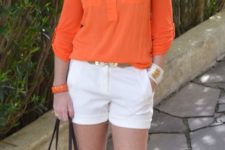 21 white shorts, an orange shirt, neutral heels and a leopard print bag