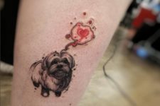 Dog and red heart tattoo
