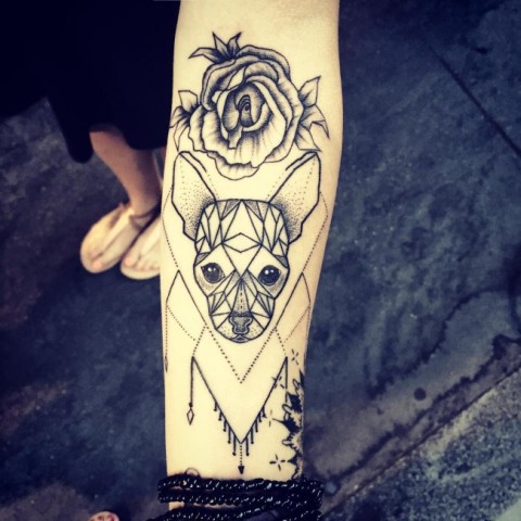 Dog with flower tattoo