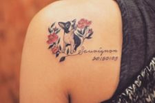 Dog with flowers and date tattoo