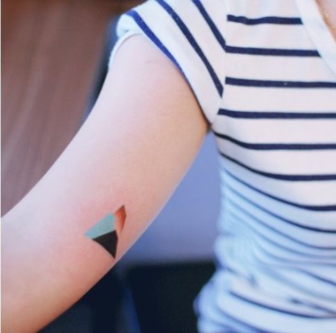 Geometric tattoo on the arm