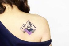 Mountain with reflection tattoo on the shoulder