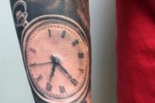 Realistic clock tattoo