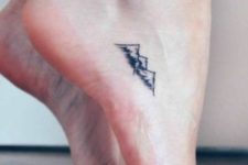Tiny tattoo on the foot
