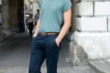 With black hat, navy blue cuffed pants and t-shirt