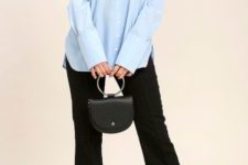 With light blue off the shoulder blouse, black trousers and black ankle strap sandals