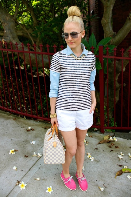 With light blue shirt, striped shirt, white shorts and printed bag