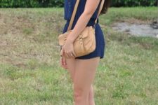 With light brown bag and beige sandals