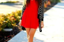 With striped cardigan and black platform shoes