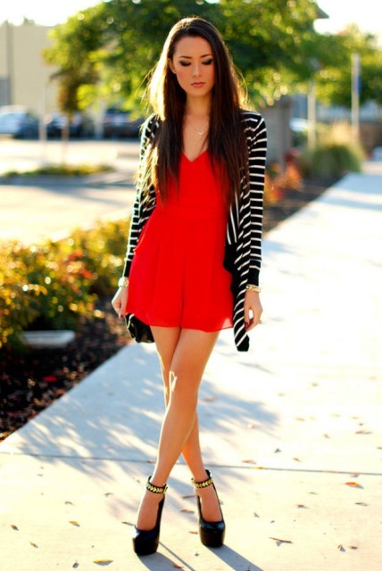With striped cardigan and black platform shoes