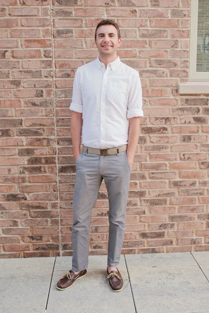 With white shirt, gray trousers and belt