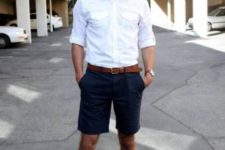 With white shirt, navy blue shorts and brown belt