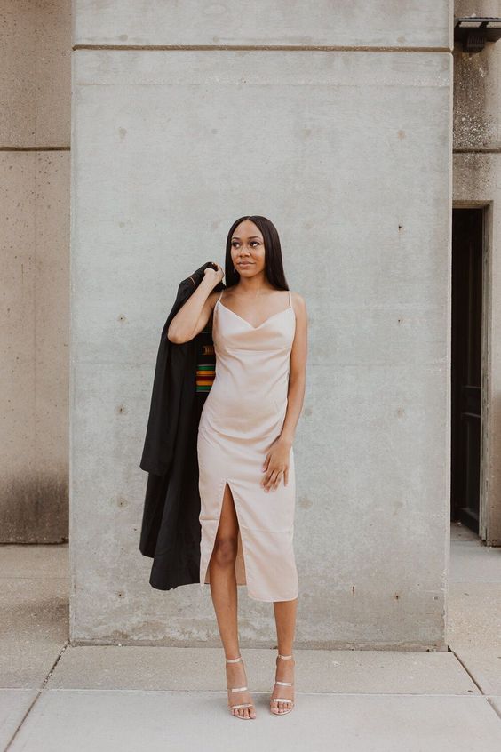 a blush slip midi dress with a frost slit, a black robe and metallic shoes are a chic and sexy combo to try