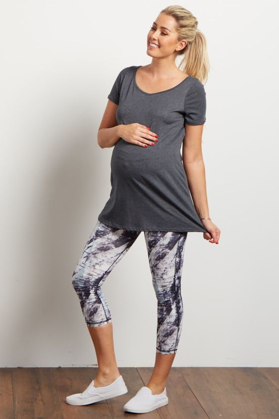 printed cropped leggings, a grey tee and white sneakers