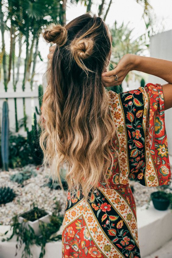 half updo with long waves down and two funny buns