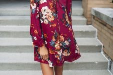 06 fuchsia mini dress with lacing up, long sleeves and floral prints worn with brown ankle booties