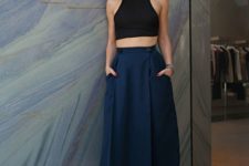 07 a black halter neckline top, a navy midi skirts with pockets and black heels
