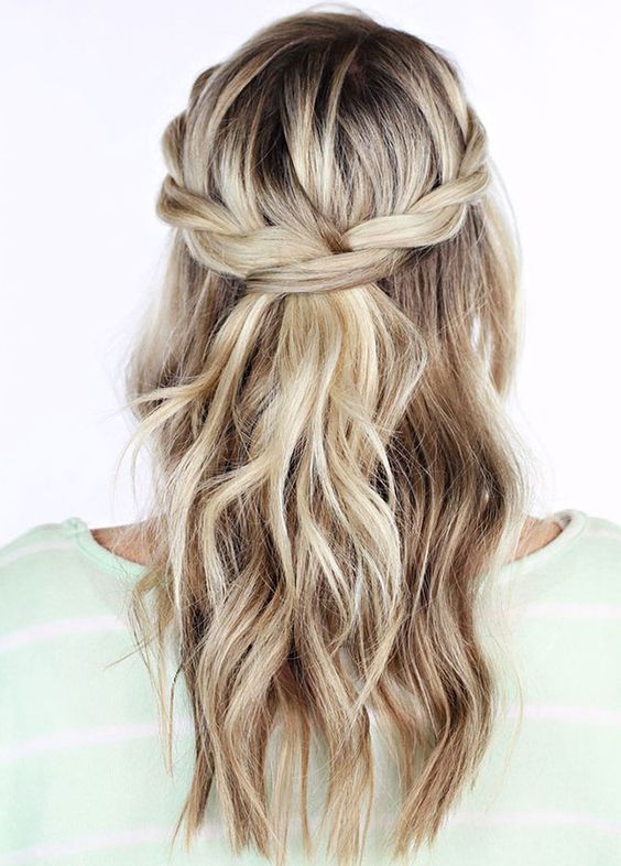 a half updo with twists and loose waves down is ideal for hot and humid weather