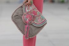 11 a grey clutch with pink and turquoise beads and sequins and a large tassel for a glam look