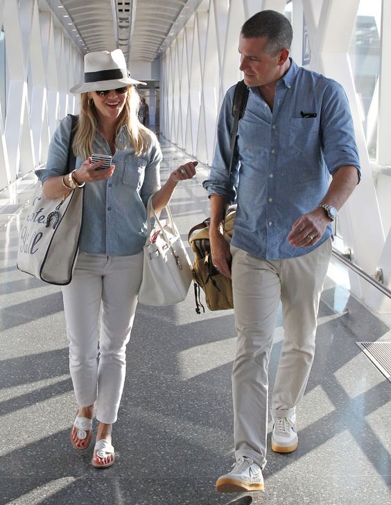 Exclusive... 51818428 Couple Reese Witherspoon and Jim Toth arriving on a flight in Boston, Massachusetts on August 7, 2015. The pair were heading to their second flight to Nantucket but were informed that the airline had lost their luggage. FameFlynet, Inc - Beverly Hills, CA, USA - +1 (818) 307-4813