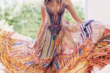 14 colorful printed maxi dress with a plunging neckline and tassels
