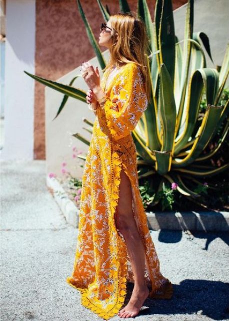 bold yellow dress with appliques, long sleeves and a side slit for sunny days