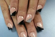 15 geometric nails with black and silver glitter triangles
