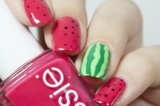 20 watermelon inspired nails – pink dotted ones and a striped green accent one