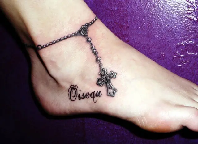 Beautiful tattoo with cross