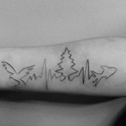 Bird, tree and fish heartbeat tattoo on the arm