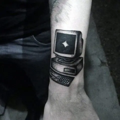 Black computer tattoo on the hand