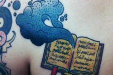 Blue smoke coming out of the book tattoo