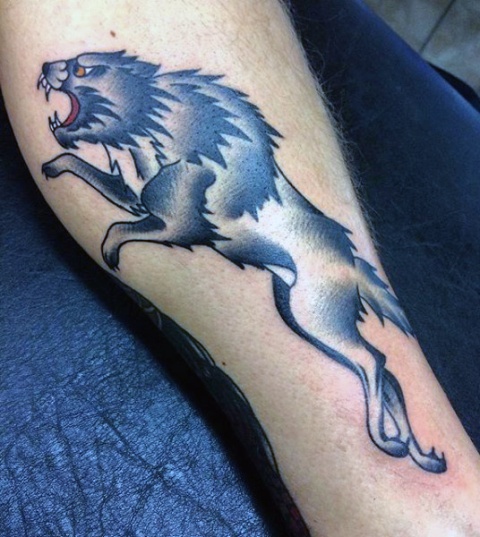 Blue wolf tattoo