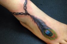 Bracelet with peacock feather tattoo on the ankle