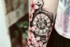 Clock with cherry blossoms tattoo