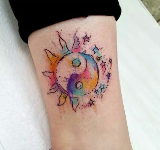 Colorful tattoo on the leg