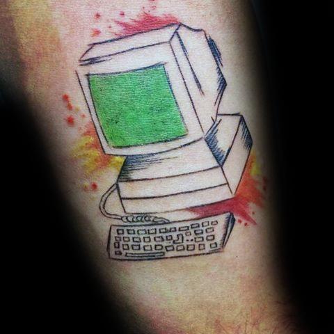 Computer with green screen tattoo