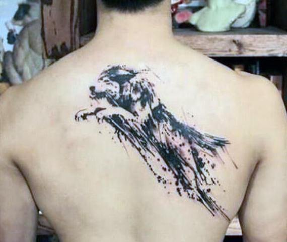 Creative wolf tattoo on the back
