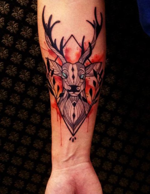 Deer with blue eyes tattoo
