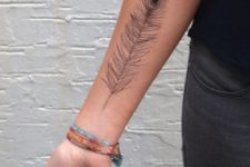 Feather tattoo on the arm