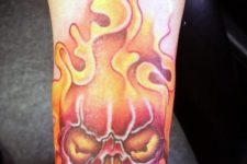 Flame and skull tattoo