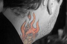 Flame tattoo on the neck