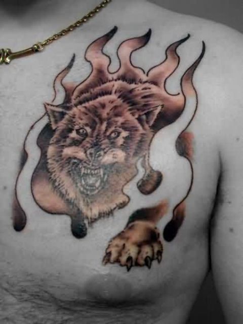 Flaming wolf tattoo on the chest