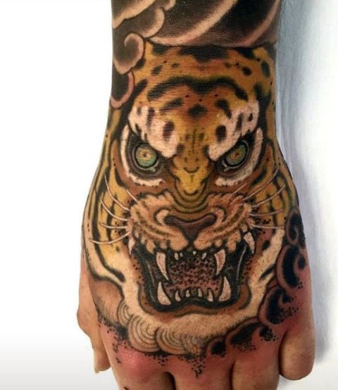 Formidable tiger face tattoo