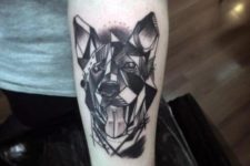 Geometric dog design tattoo on the arm