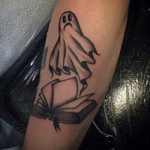 Ghost and book tattoo
