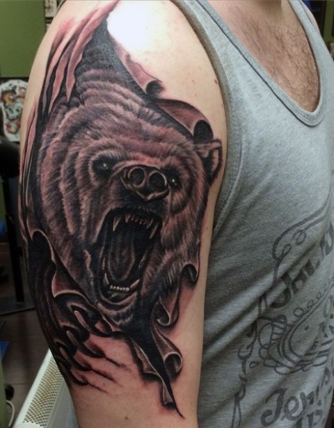 Half-sleeve bear tattoo