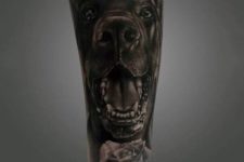 Half sleeve dog and rose tattoo