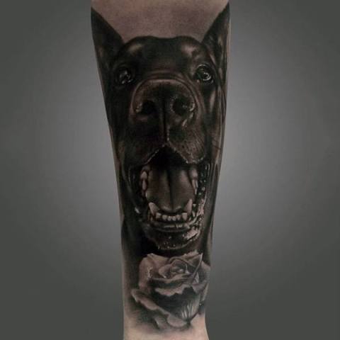 Half sleeve dog and rose tattoo