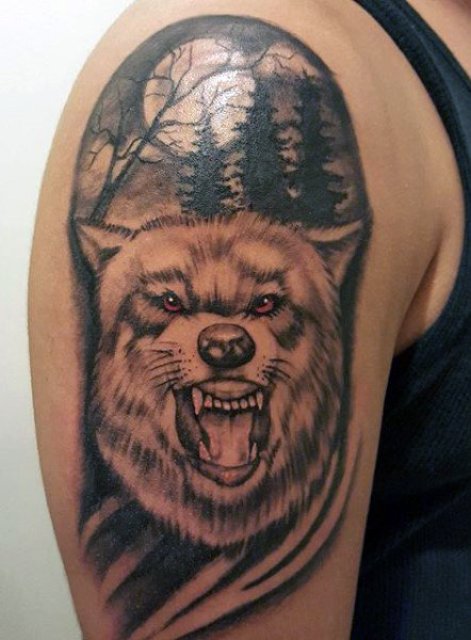 Half-sleeve wolf and trees tattoo